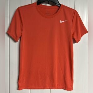 Nike Women’s Coral Orange Dri-Fit Tee with White Swoosh